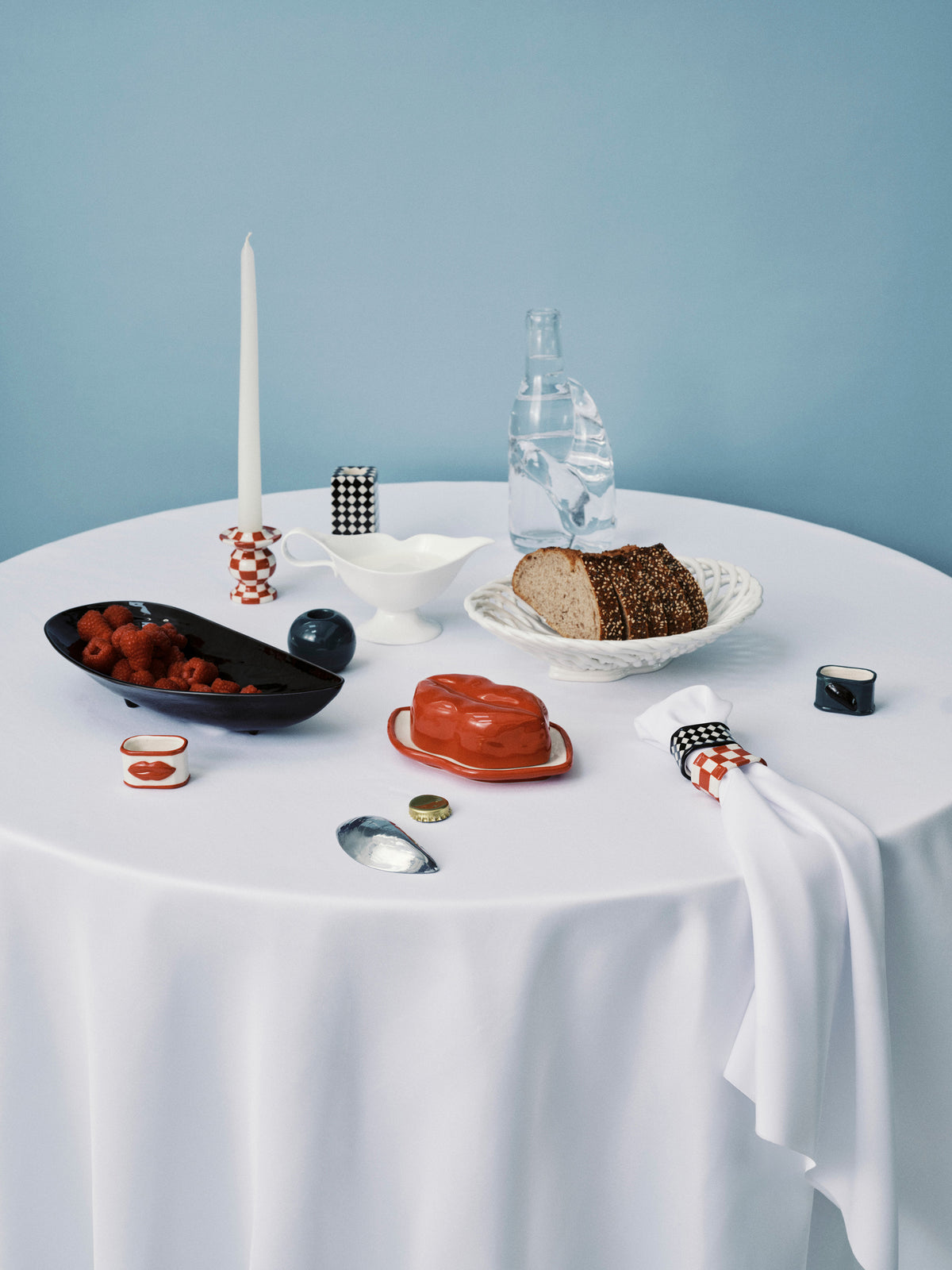 Kerzenständer rot/weiß mit Schachbrettmuster – Les Objets Mouleversants
